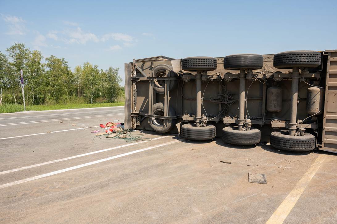 A truck that has been crashed on the side of the road

AI-generated content may be incorrect.